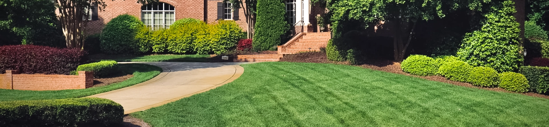 Home maintenance showing a beautiful white house being well maintained